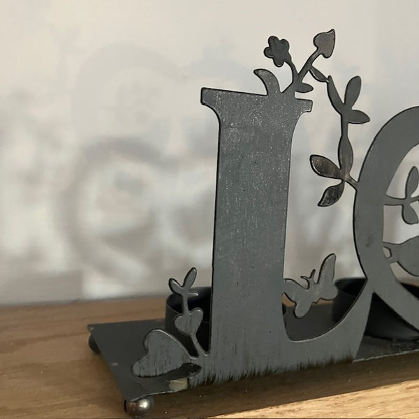 The 'Love' Metal Tea Light Holder is the perfect cosy home decor to add gorgeous ambient lighting to your home or dining table