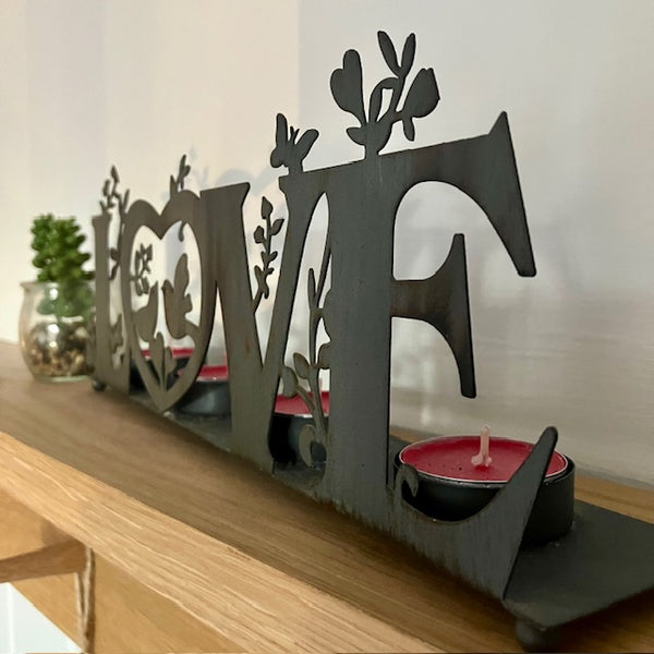 The 'Love' Metal Tea Light Holder is the perfect cosy home decor to add gorgeous ambient lighting to your home or dining table