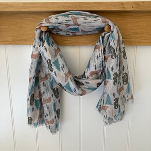 The Mama Bear Scarf Grey is an adorable forest themed print in subtle Scandinavian colours