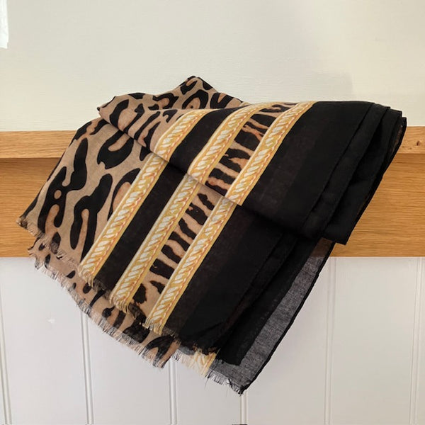 The Mari Leopard Print Black is a light weight scarf