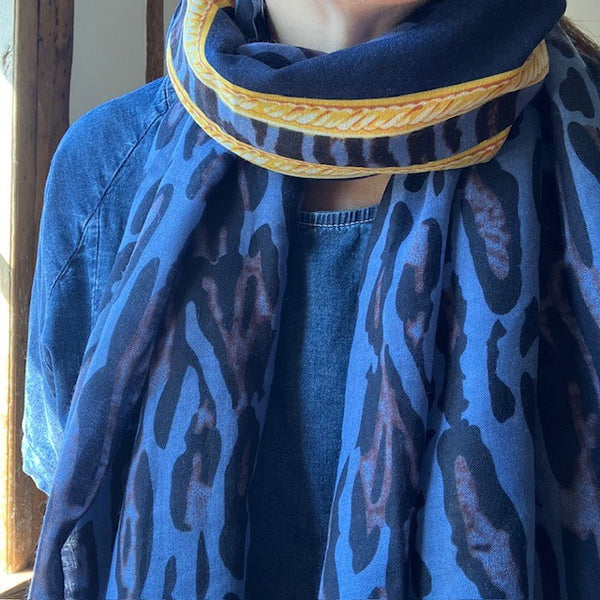 The Mari Leopard Print scarf is rectangular