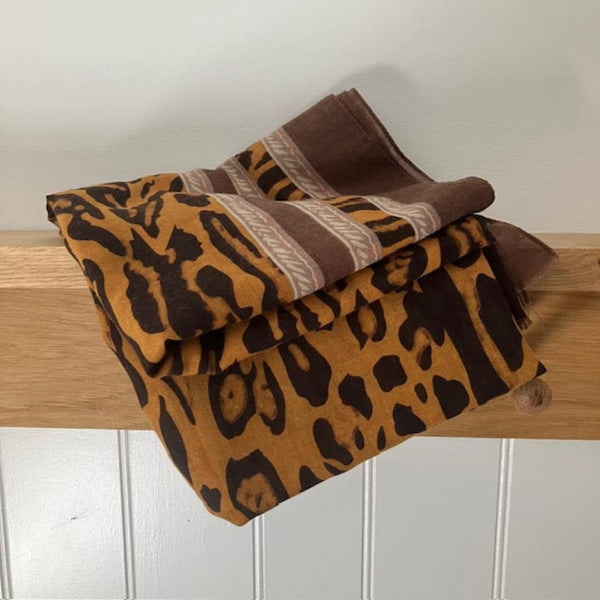 The Mari Leopard Print Brown is a must have animal print scarf that will elevate any outfit