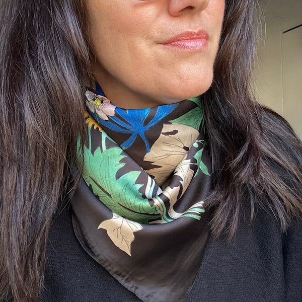 The Meadow Scarf Black is the perfect accessory to add a pop of pattern and colour to any outfit