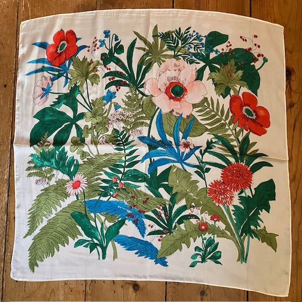 The Meadow Scarf Cream is a square shape and can be worn so many different ways.