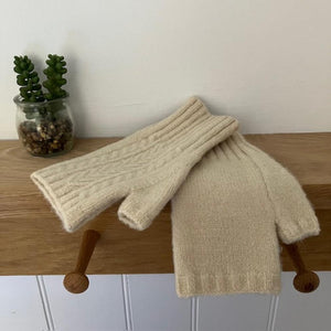 The Mildred Cashmere Fingerless Gloves Cream are luxurious and ideal if you want your fingers free but still have lovely cosy and warm hands