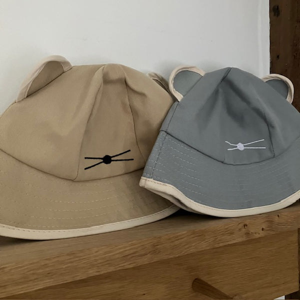 The Minnie Bucket Hat Sand & Cream is a super cute and cosy hat for kids and adults alike