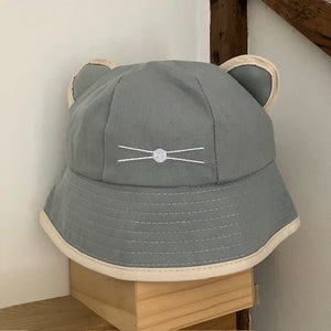 The Minnie Bucket Hat Duck Egg Blue & Cream is a super cute and cosy hat for kids and adults alike