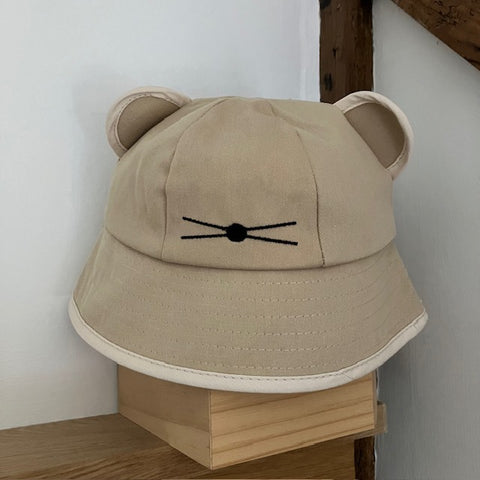 The Minnie Bucket Hat Sand & Cream is a super cute and cosy hat for kids and adults alike