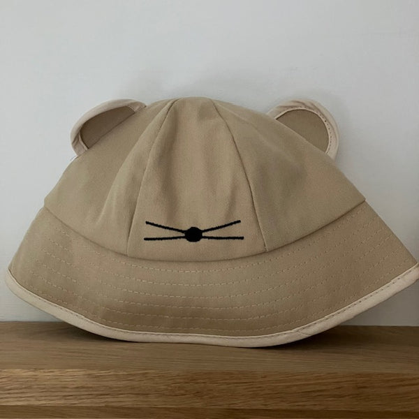 The Minnie Bucket Hat Sand & Cream is a super cute and cosy hat for kids and adults alike