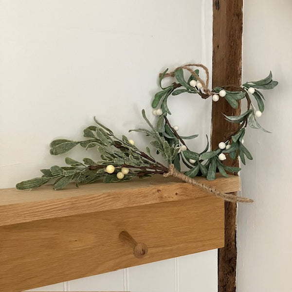 The Faux Bunch of Mistletoe is a charming cosy Christmas decoration to add to your home this festive season