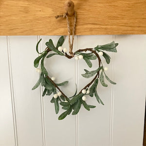 The Faux Mistletoe Heart is a charming cosy accessory to add to your Christmas decor this festive season