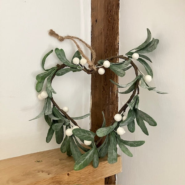 The Faux Mistletoe Heart is a charming cosy accessory to add to your Christmas decor this festive season