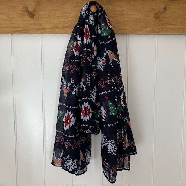 The Noelle Scarf Navy is the perfect Christmas accessory for the festive season