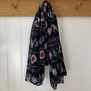 The Noelle Scarf Navy is the perfect Christmas accessory for the festive season