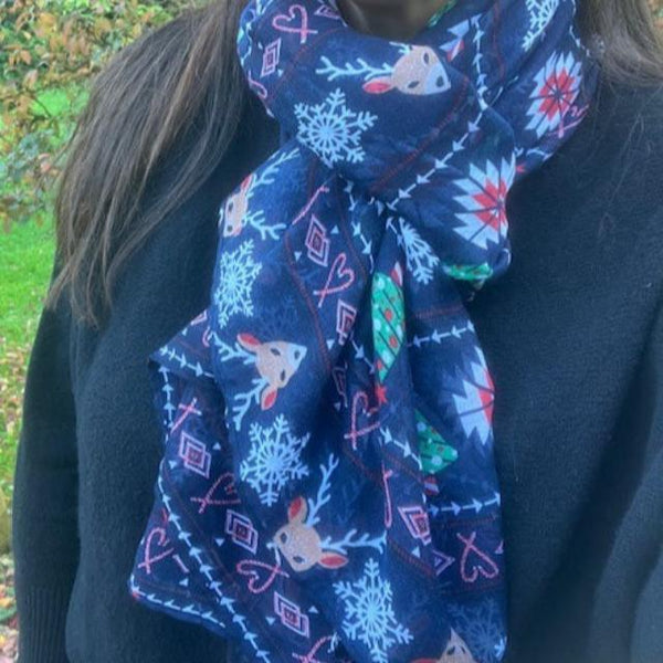 The Noelle Scarf Navy is the perfect Christmas accessory for the festive season