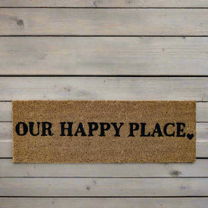 The Cosy Step Doormat 'Our Happy Place' will add a warm welcome to your home