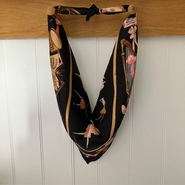 The Pavlova Scarf is a small square, ideal for styling into the on-trend triangle scarf