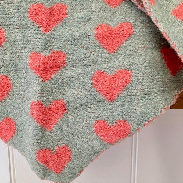 The Pixie Scarf Duck Egg Blue is a gorgeous almost light blue turquoise colour with pretty pink love hearts