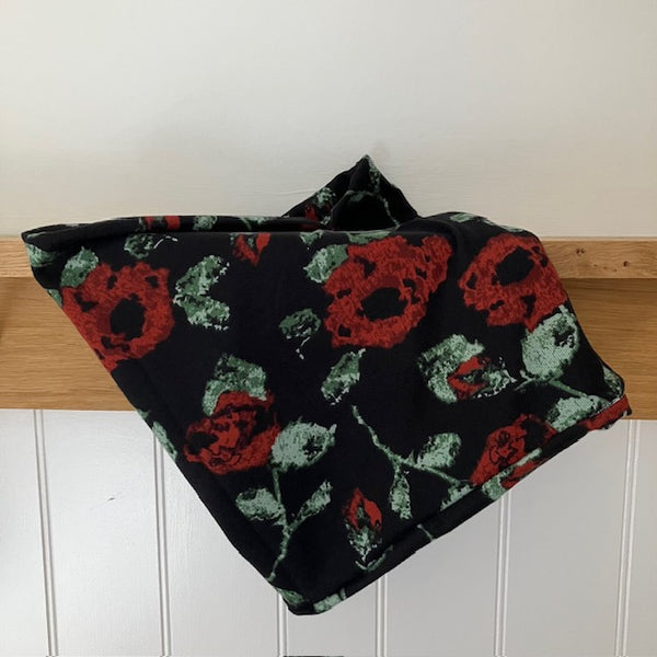 The Abella Snood Poppy Black has a fabulous bold floral print to add pattern to your outfit and will keep you cosy and warm