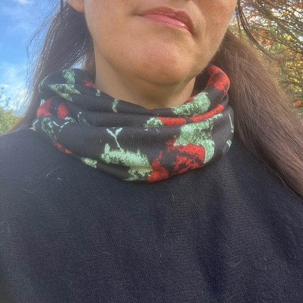 The Abella Snood Poppy Black has a fabulous bold floral print to add pattern to your outfit and will keep you cosy and warm