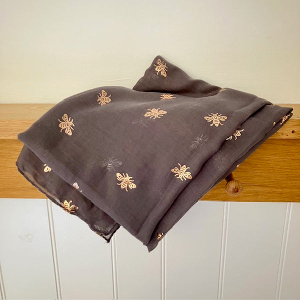 The Queenie Scarf is a lightweight scarf that can be worn all year round
