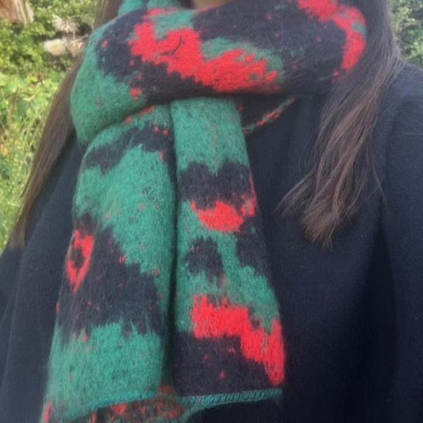 The Riley Leopard Print Knitted Scarf Green in these fabulous bold colours is super soft and cosy