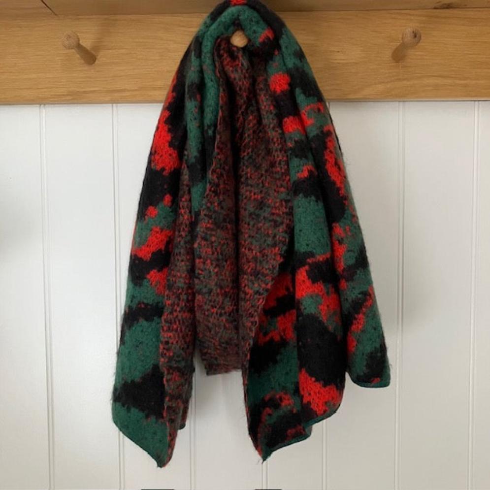 The Riley Leopard Print Knitted Scarf Green in these fabulous bold colours is super soft and cosy