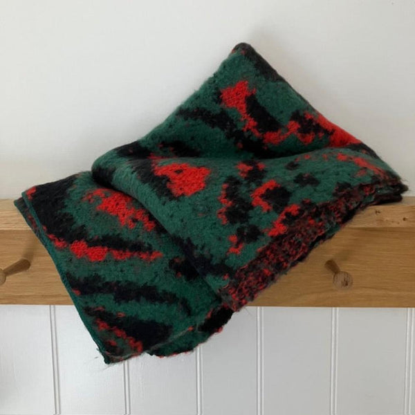 The Riley Leopard Print Knitted Scarf Green in these fabulous bold colours is super soft and cosy