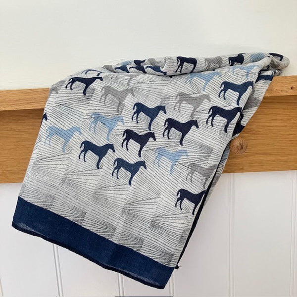 The Rosaline Scarf Blue is a rectangular shape