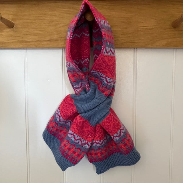 The Runa Scarf is a unique pull through design that gives exceptional warmth to the neck