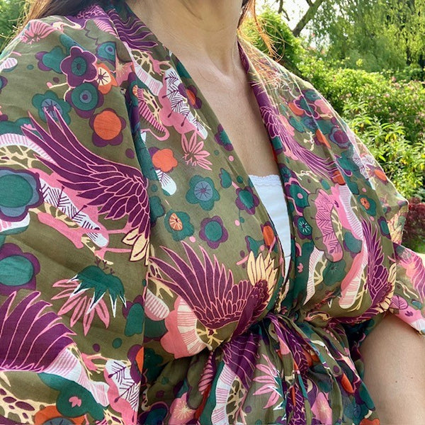 The Sakura Kaftan Khaki has a central tie with ample material to adjust to your size