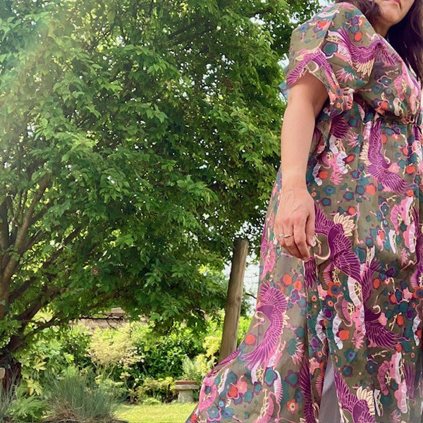The Sakura Kaftan Khaki has a side split for ease of movement