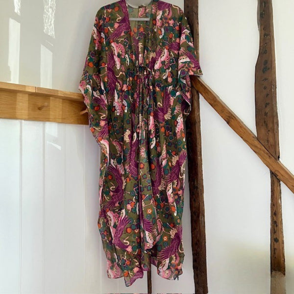 The Sakura Kaftan Khaki has the most beautiful abstract floral print with flying cranes in exquisite colours. It has a Japanese aesthetic and oozes boho glamour.