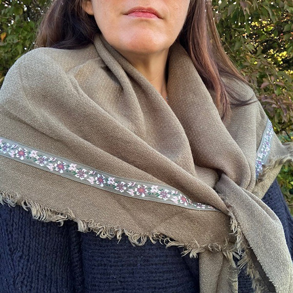 The Samantha Scarf Khaki can be worn loose over the shoulders or snug around the neck as a snood