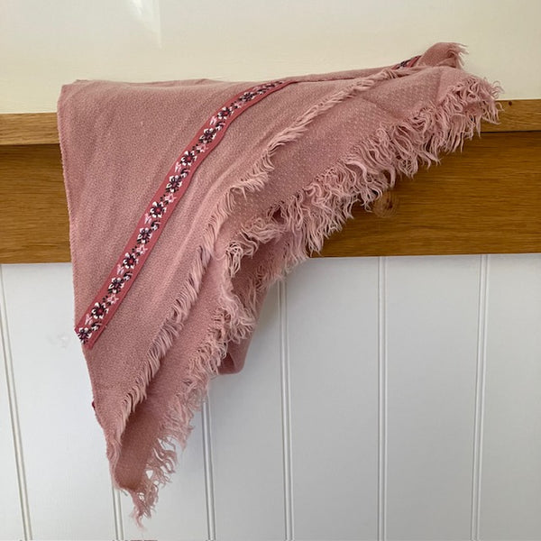 The Samantha Scarf Pink is a triangle shaped scarf