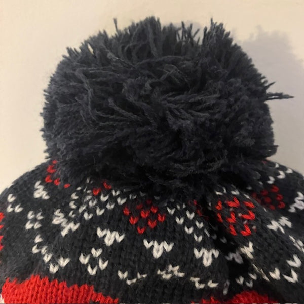 The Santa Hat Navy is a fabulously festive and cosy hat, perfect for the Christmas season