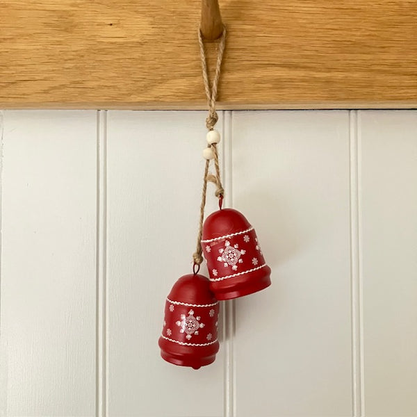 The Scandi Red Bells Decoration brings a touch of Scandinavian charm to your cosy home