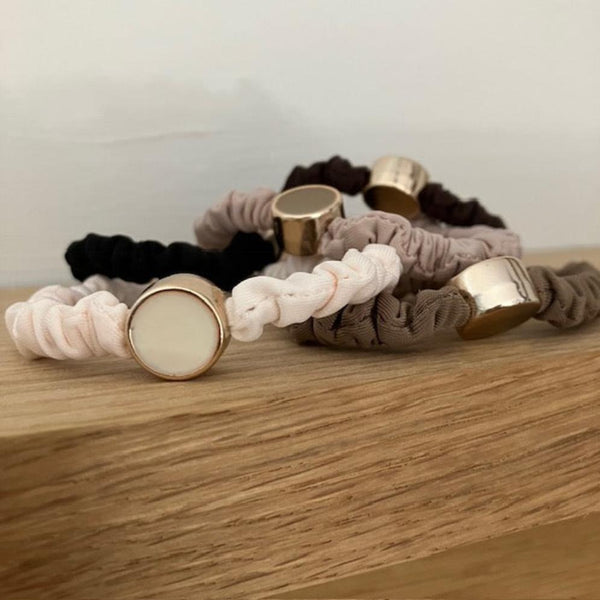 Scrunchie Hair Tie Bracelets Neutral Pack is an ideal cosy accessory to keep on your wrist for when you need to pop your hair up