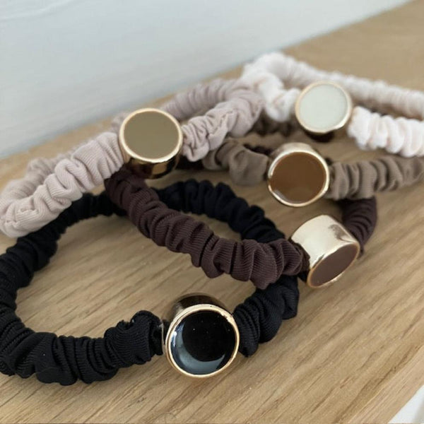 Scrunchie Hair Tie Bracelets Neutral Pack is an ideal cosy accessory to keep on your wrist for when you need to pop your hair up