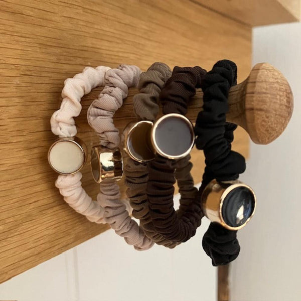 Scrunchie Hair Tie Bracelets Neutral Pack is an ideal cosy accessory to keep on your wrist for when you need to pop your hair up