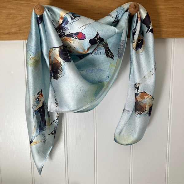 The Seatherny Scarf Blue is a small square, ideal for styling into the on-trend triangle scarf