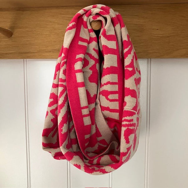 The Serenity Snood Zebra Print Pink is a gorgeously soft & stylish snood, crafted from a luxurious, ultra-cosy material that feels like pure comfort