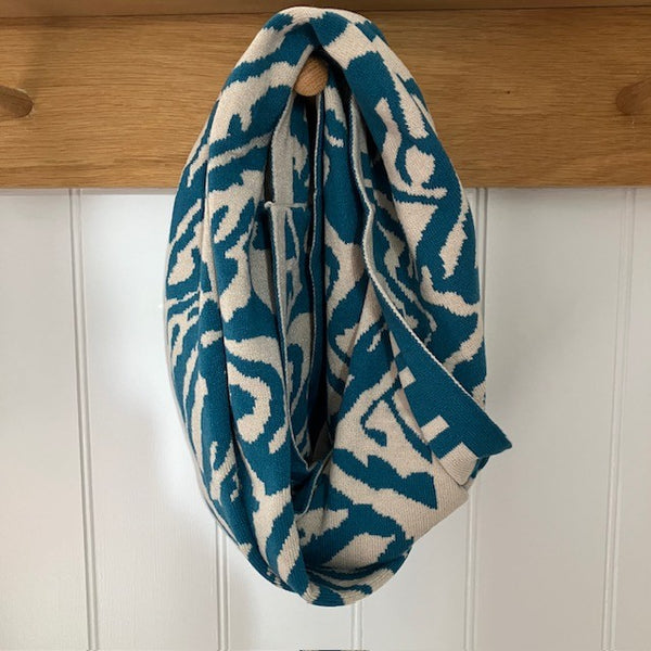 The Serenity Snood Zebra Print Teal is a gorgeously soft snood, crafted from a luxurious, ultra-cosy material that feels like pure comfort