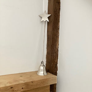 The Star Candle Snuffer extinguishes a candles flame safely