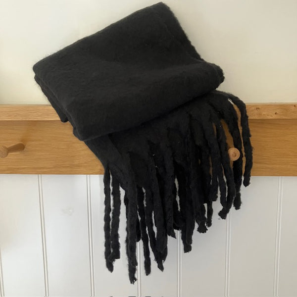 The Snuggle - Black scarf is incredibly soft, warm and cosy. Who knew a scarf could make you feel this good!