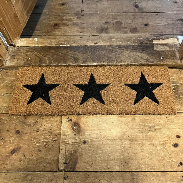 The Cosy Step Doormat Nordic Stars will add a warm welcome to your home