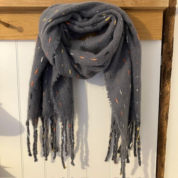 The Theodora Grey is a super soft large statement scarf that will keep you very cosy and warm 