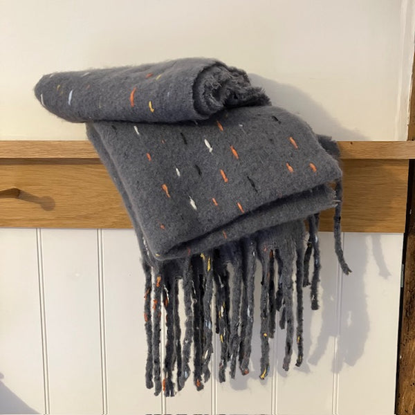 The Theodora Grey is a super soft large statement scarf that will keep you very cosy and warm 