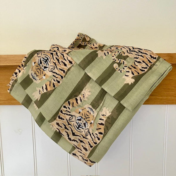 The Tigerlily Scarf Green is made from Cotton and Polyester