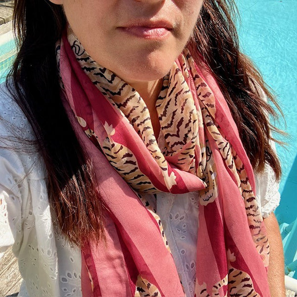 The Tigerlily Scarf Pink is lightweight enough for summer holidays and cosy for all year round